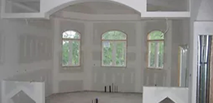 White wall finished living space with windows